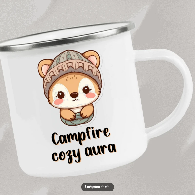 Funny animal character wearing a knitted hat, looking cozy and content, depicted on a rustic enamel camping mug.