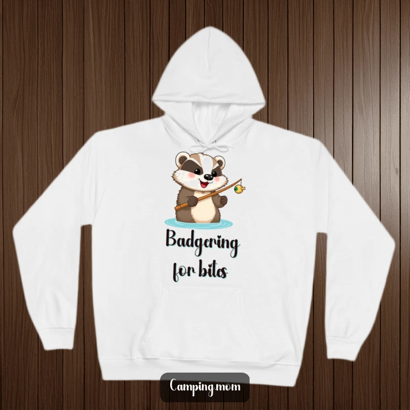 Funny hoodie featuring a happy badger with a fishing rod, looking forward to a catch, offering warmth and angling humor.