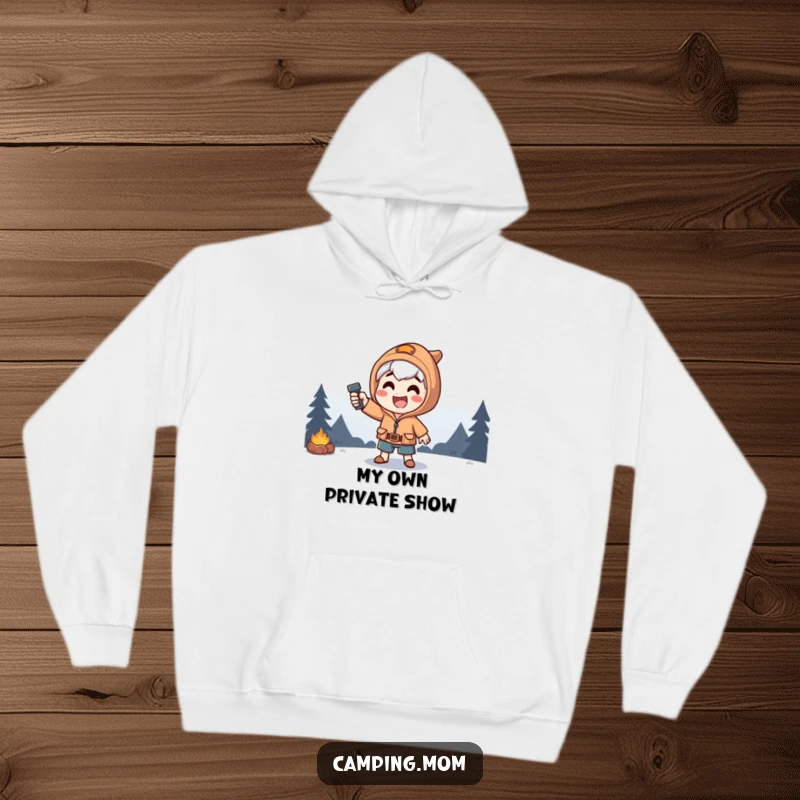Funny hoodie depicting a happy camping character in a theatrical, dramatic pose, highlighted by a striking flashlight beam.