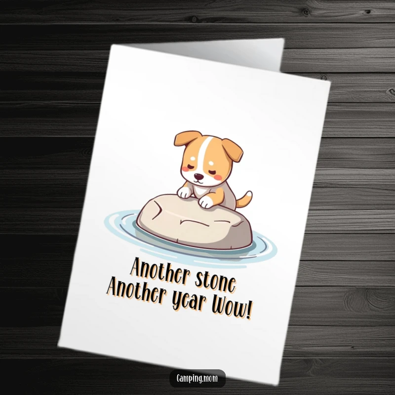 Funny free printable birthday card of a dog finding a smooth, perfect skipping stone near a body of water.