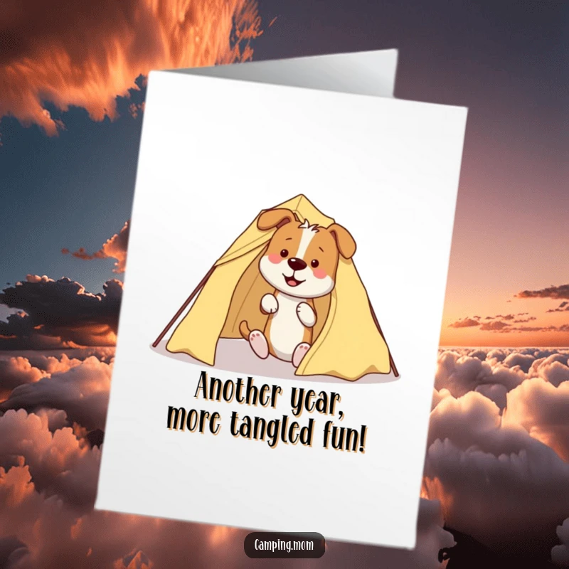 Funny free printable birthday card depicts a dog hilariously tangled in tent poles while trying to set up camp.