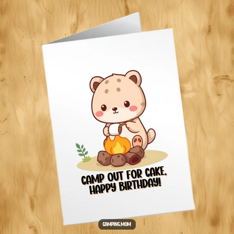 Free Printable Birthday Card: Kawaii camping animal happily roasts a marshmallow over a tiny campfire, spreading cheer.