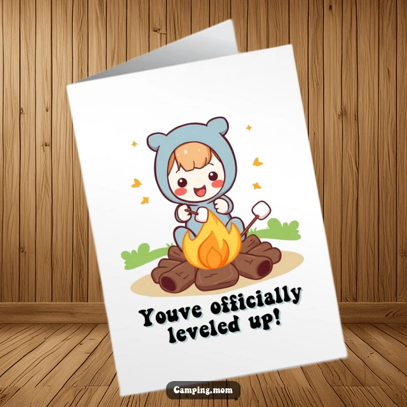 Free printable congratulations card showing a joyful character roasting marshmallows over a campfire, ideal for a downloadable gift.