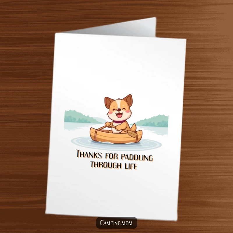 Funny free printable thank you card with a dog contentedly paddling a canoe on a calm lake.