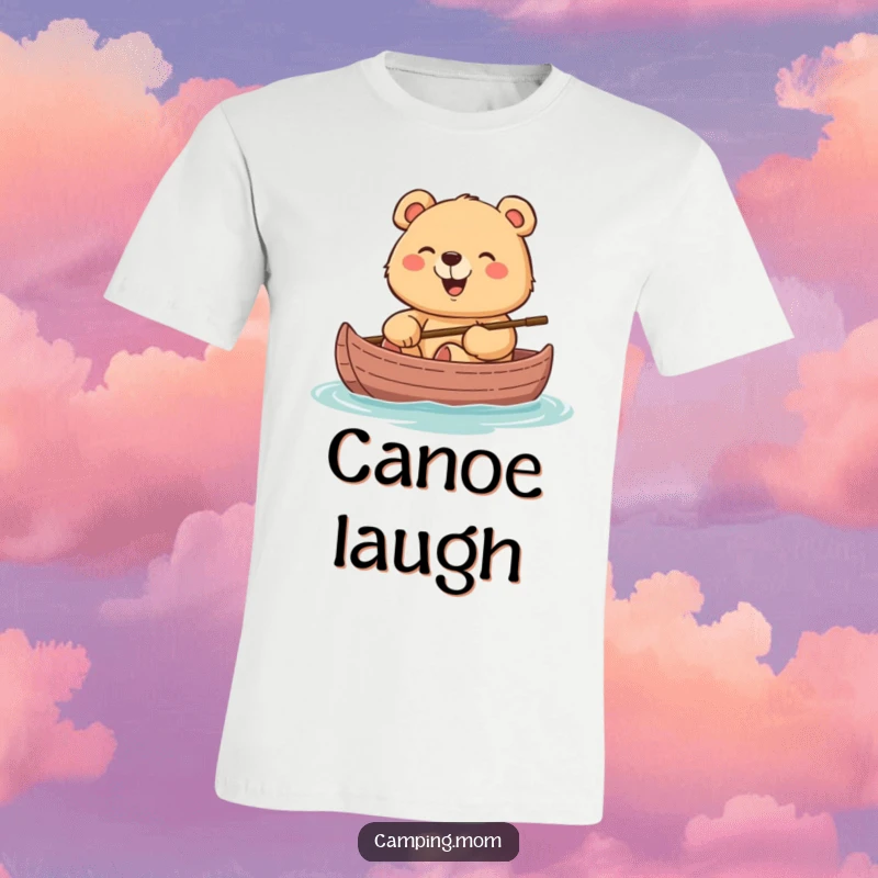 Funny t-shirt featuring a mama bear with a wide, cheerful grin, giggling while comfortably seated in a canoe.
