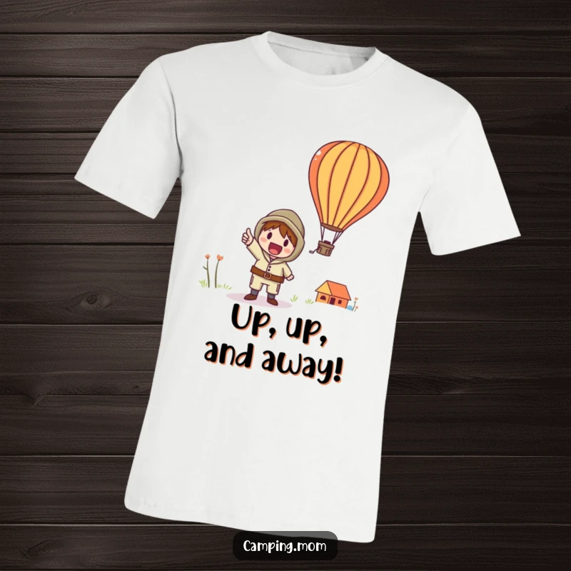 Funny t-shirt depicting a whimsical camping character with excitement, pointing towards a majestic hot air balloon in the sky.