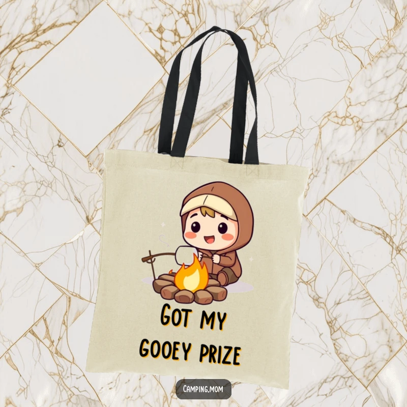 Funny tote bag with a smiling camping character focused on roasting a perfectly golden-brown marshmallow over a warm campfire.