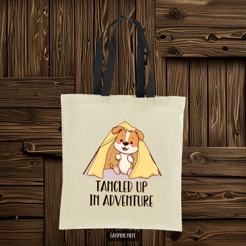 Funny Dog Tote Bag: A durable tote bag featuring a dog humorously tangled in tent poles and fabric during setup.